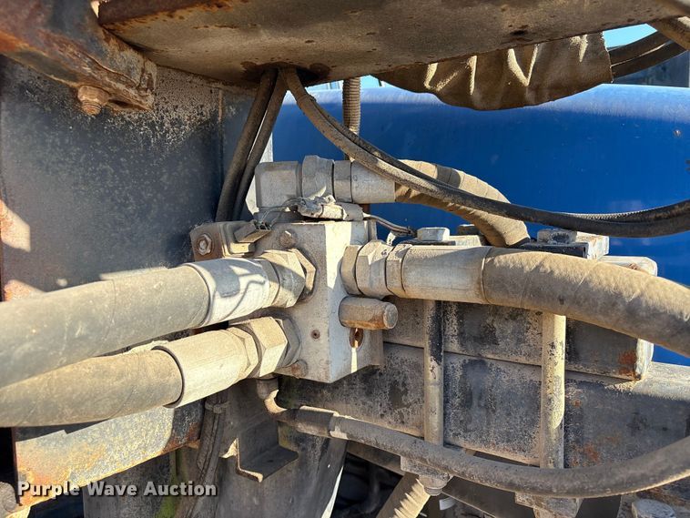 image for item EA7043 New Holland TS115A MFWD tractor