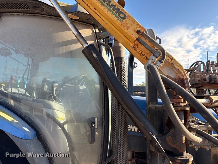 image for item EA7043 New Holland TS115A MFWD tractor