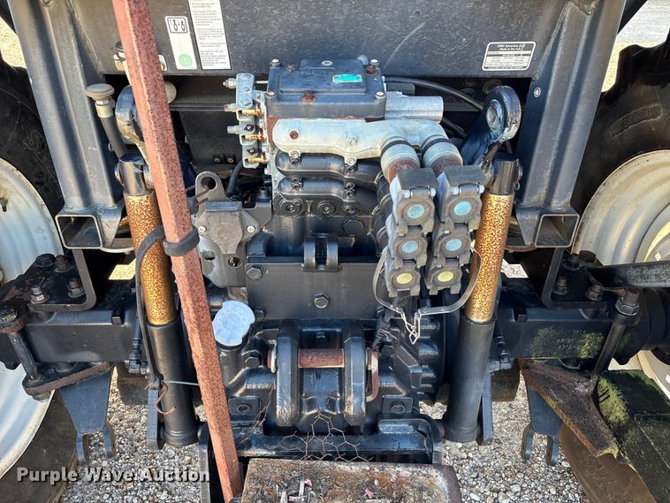 image for item EA7043 New Holland TS115A MFWD tractor