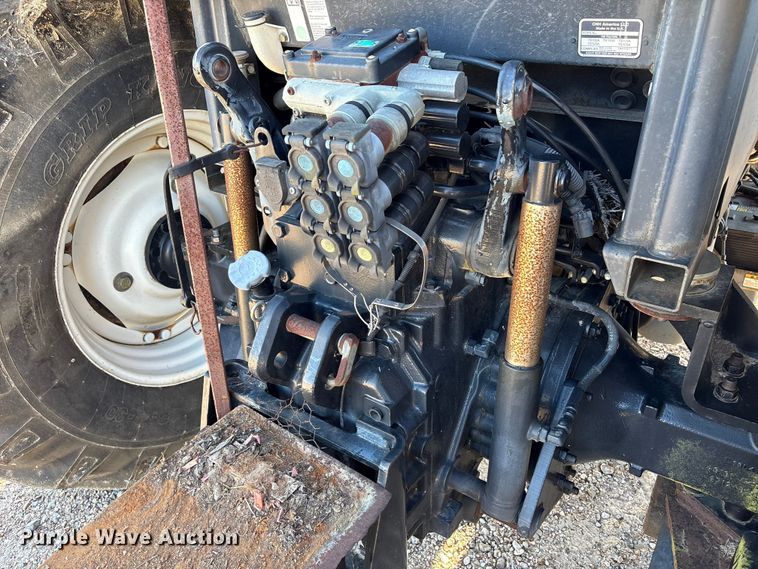 image for item EA7043 New Holland TS115A MFWD tractor