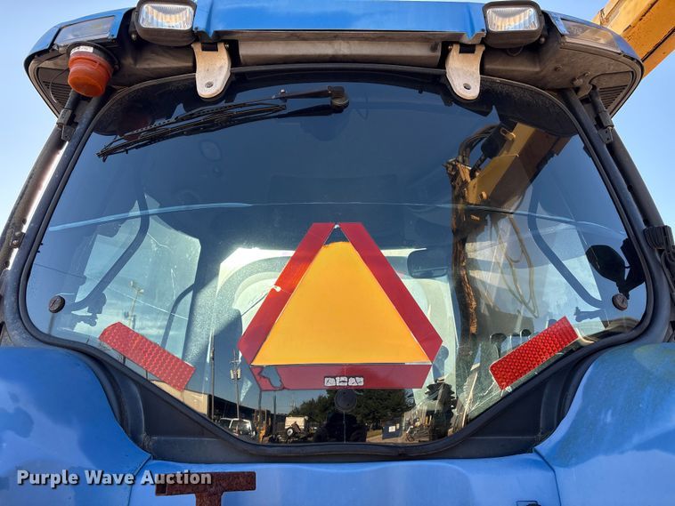 image for item EA7043 New Holland TS115A MFWD tractor