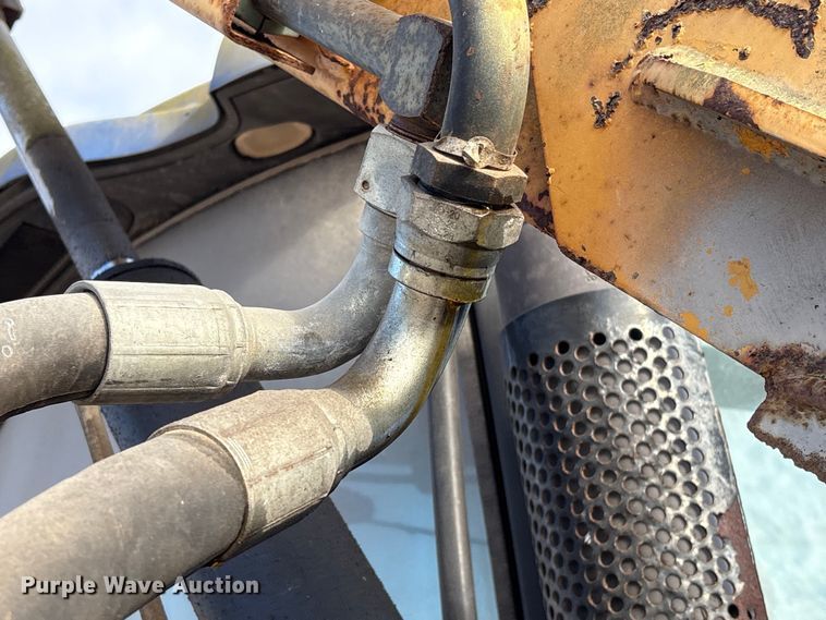 image for item EA7043 New Holland TS115A MFWD tractor