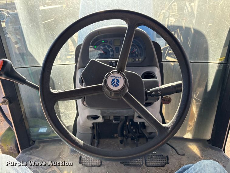 image for item EA7043 New Holland TS115A MFWD tractor