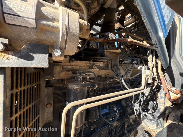 image for item EA7043 New Holland TS115A MFWD tractor