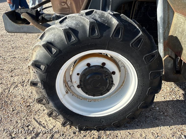 image for item EA7043 New Holland TS115A MFWD tractor