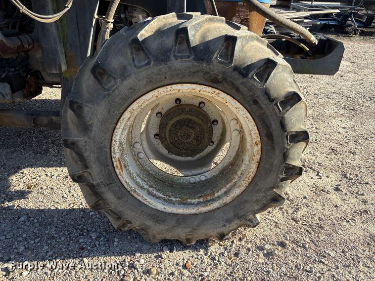 image for item EA7043 New Holland TS115A MFWD tractor