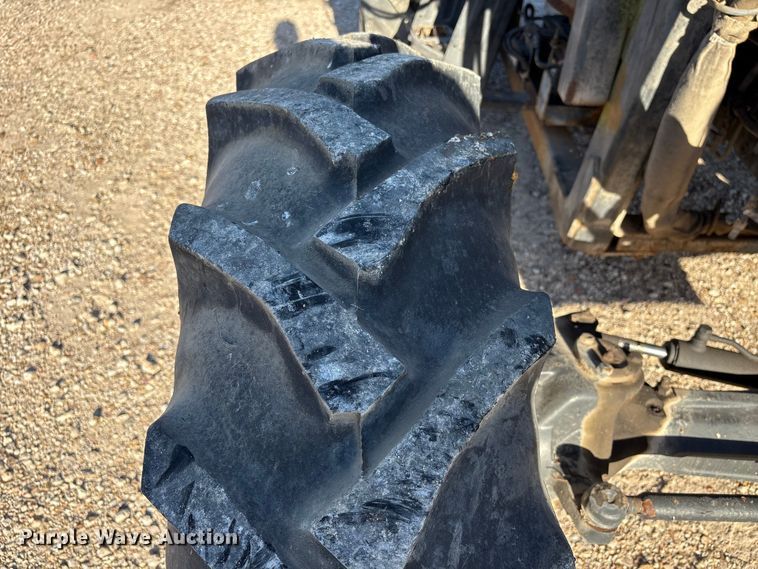 image for item EA7043 New Holland TS115A MFWD tractor