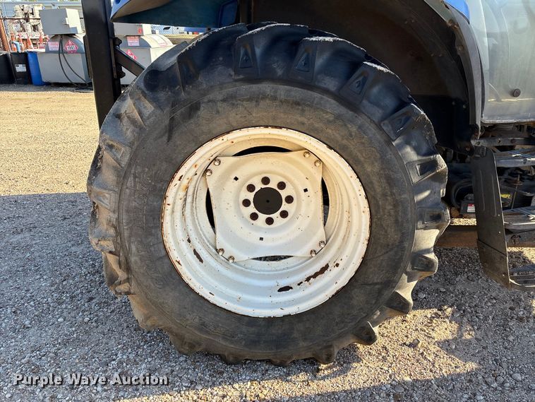 image for item EA7043 New Holland TS115A MFWD tractor