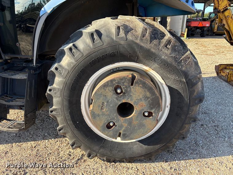 image for item EA7043 New Holland TS115A MFWD tractor