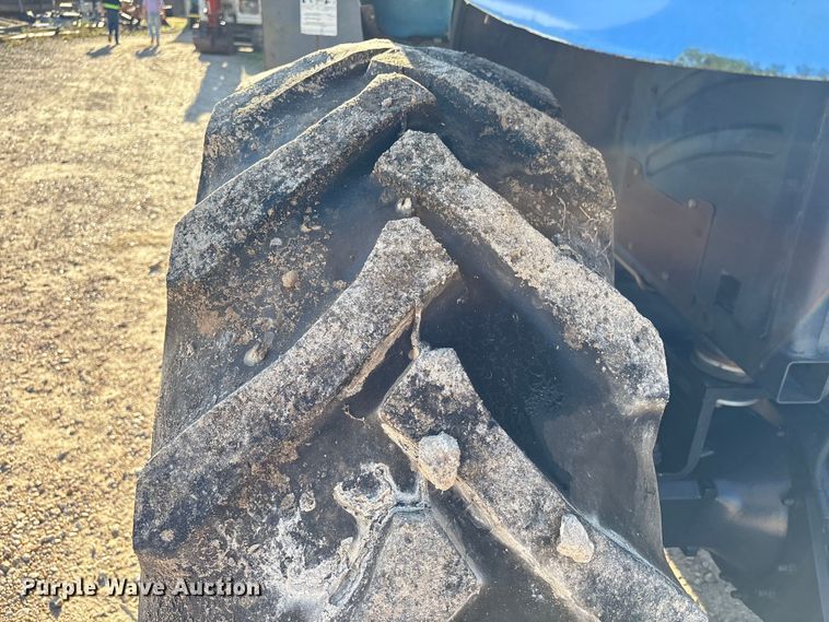 image for item EA7043 New Holland TS115A MFWD tractor