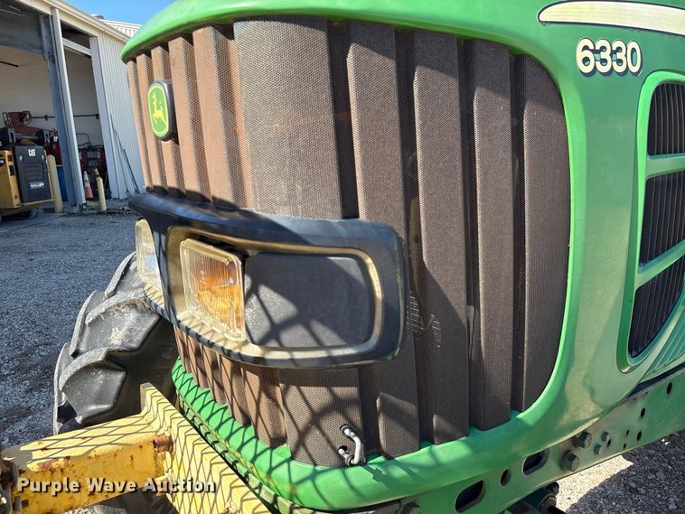 image for item EA7054 2010 John Deere 6330 MFWD tractor