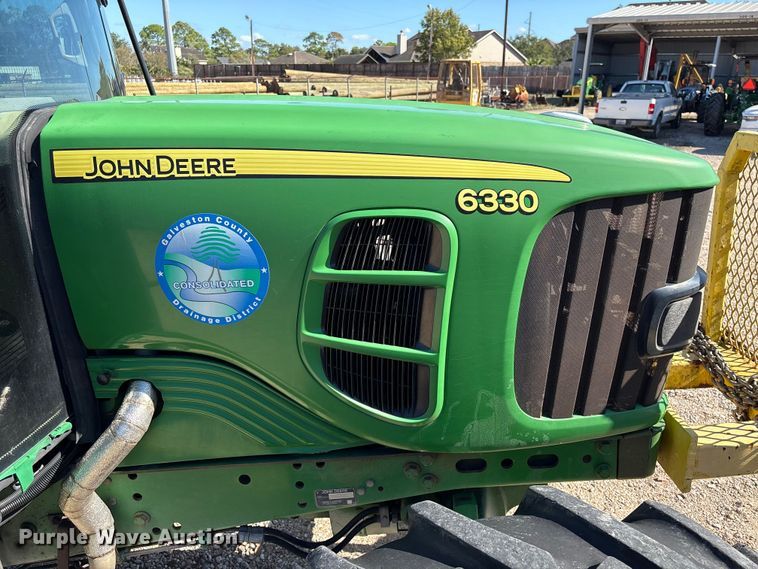 image for item EA7054 2010 John Deere 6330 MFWD tractor