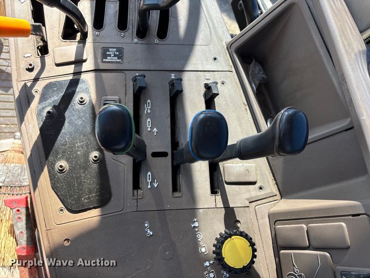 image for item EA7054 2010 John Deere 6330 MFWD tractor