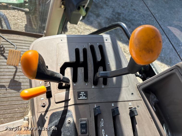 image for item EA7054 2010 John Deere 6330 MFWD tractor