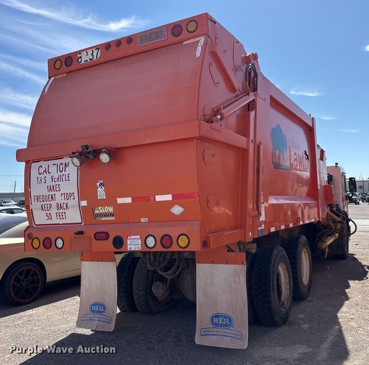 image for item EA7649 2013 Peterbilt 320 refuse truck