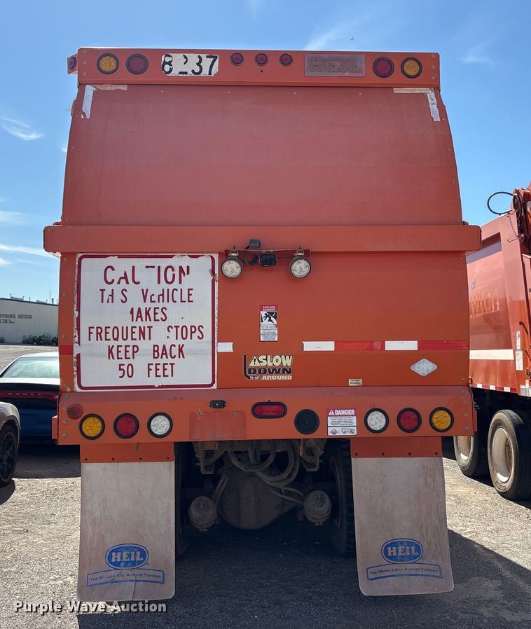 image for item EA7649 2013 Peterbilt 320 refuse truck