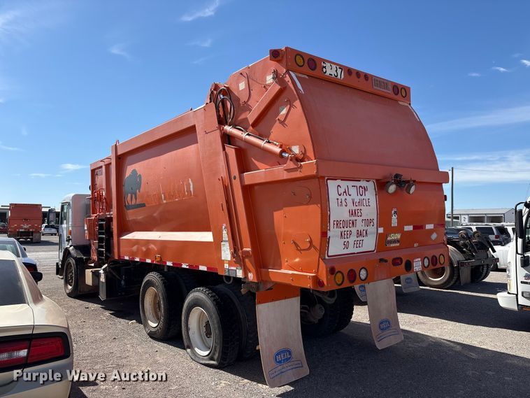 image for item EA7649 2013 Peterbilt 320 refuse truck