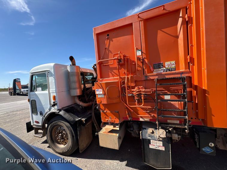 image for item EA7649 2013 Peterbilt 320 refuse truck