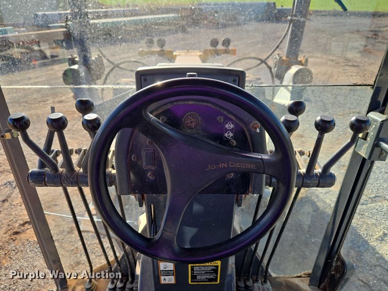 image for item ET5244 2006 John Deere 770D motor grader