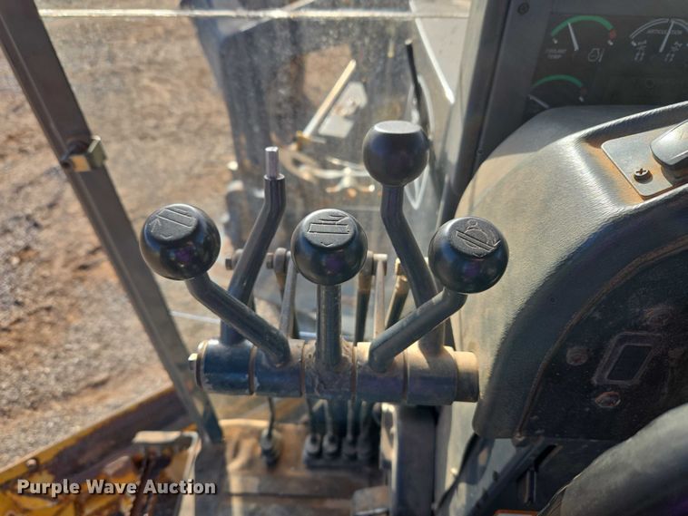 image for item ET5244 2006 John Deere 770D motor grader