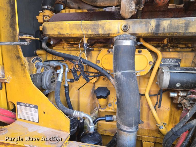 image for item ET5244 2006 John Deere 770D motor grader