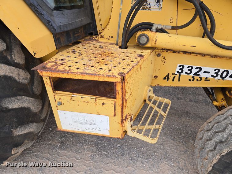 image for item ET5284 1996 John Deere 310D backhoe