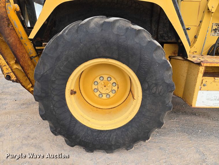image for item ET5284 1996 John Deere 310D backhoe