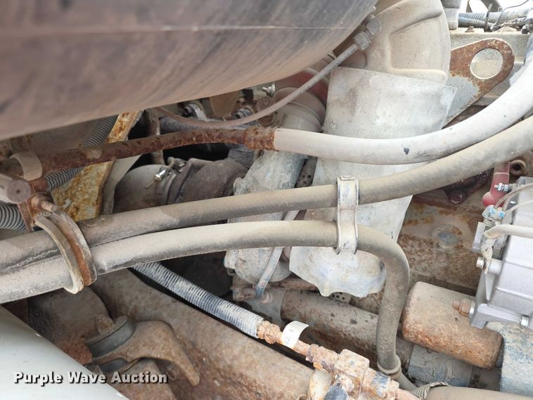 image for item FI0665 1999 International 4900 flatbed truck