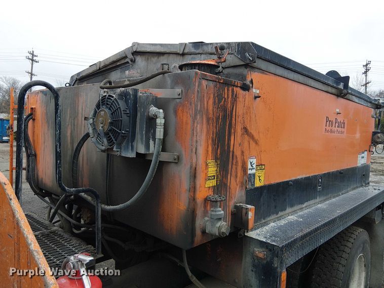 image for item FK0694 2013 Ford F750 Super Duty pothole patcher truck