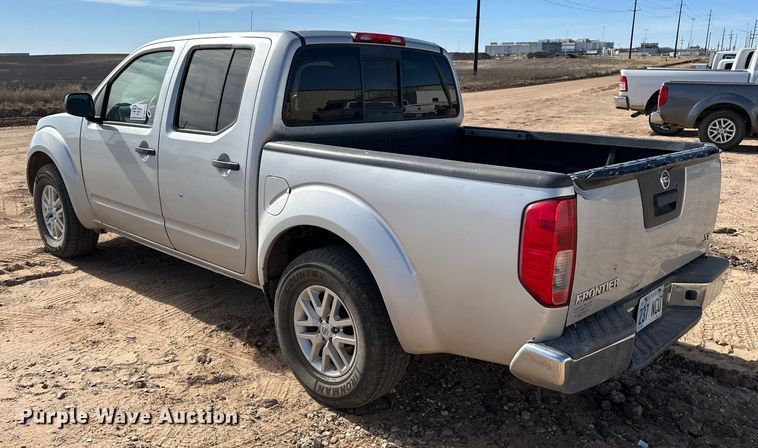 image for item DQ7728 2019 Nissan Frontier Crew Cab pickup truck