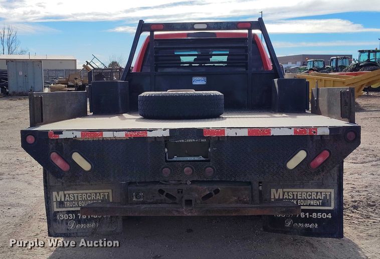 image for item DT0772 2014 RAM 3500 Crew Cab flatbed pickup truck