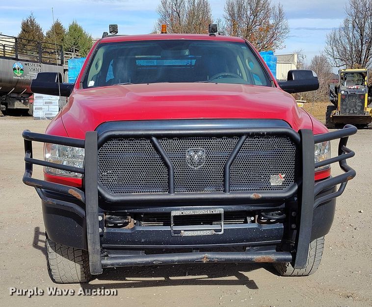 image for item DT0773 2016 RAM 3500 Crew Cab flatbed pickup truck