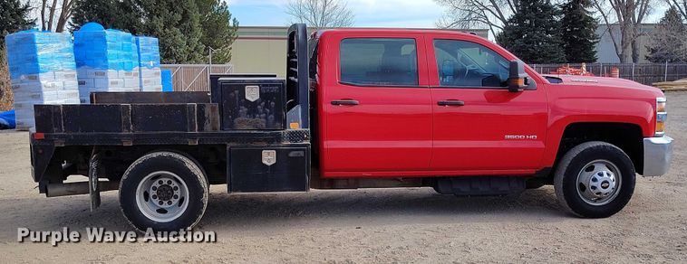 image for item DT0774 2018 Chevrolet Silverado 3500HD Crew Cab flatbed pickup truck