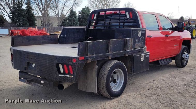 image for item DT0774 2018 Chevrolet Silverado 3500HD Crew Cab flatbed pickup truck