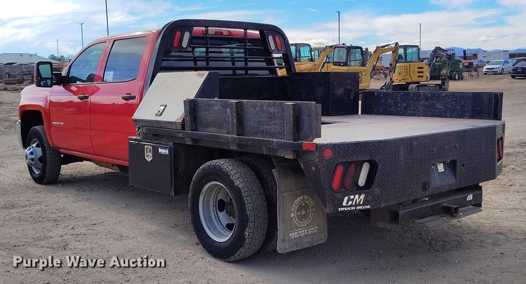 image for item DT0774 2018 Chevrolet Silverado 3500HD Crew Cab flatbed pickup truck