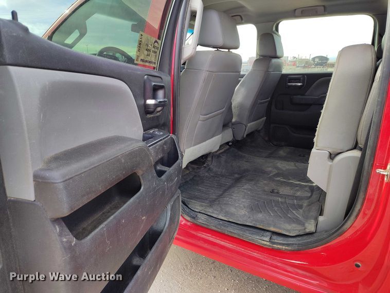 image for item DT0774 2018 Chevrolet Silverado 3500HD Crew Cab flatbed pickup truck