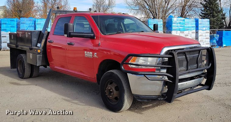 image for item DT0775 2016 RAM 3500 Crew Cab flatbed pickup truck