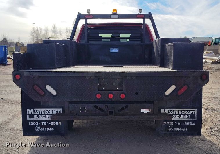 image for item DT0775 2016 RAM 3500 Crew Cab flatbed pickup truck