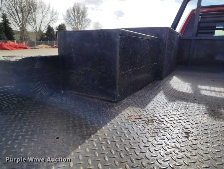 image for item DT0775 2016 RAM 3500 Crew Cab flatbed pickup truck