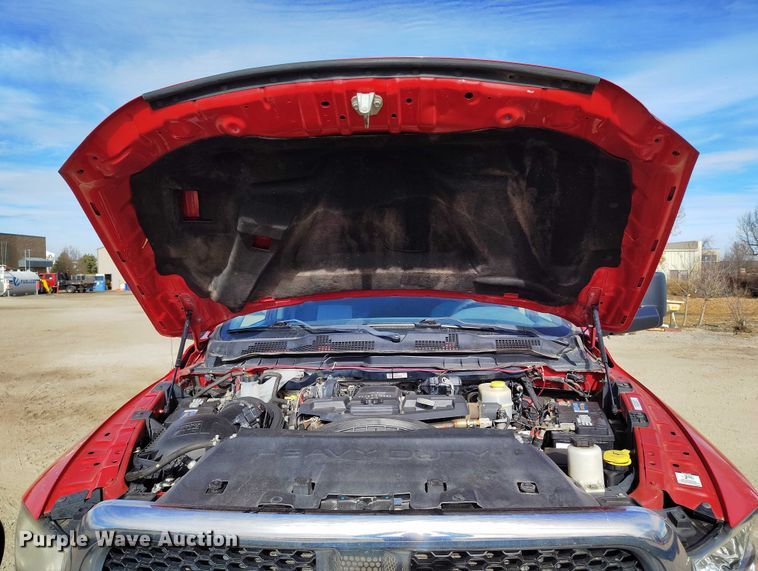 image for item DT0775 2016 RAM 3500 Crew Cab flatbed pickup truck