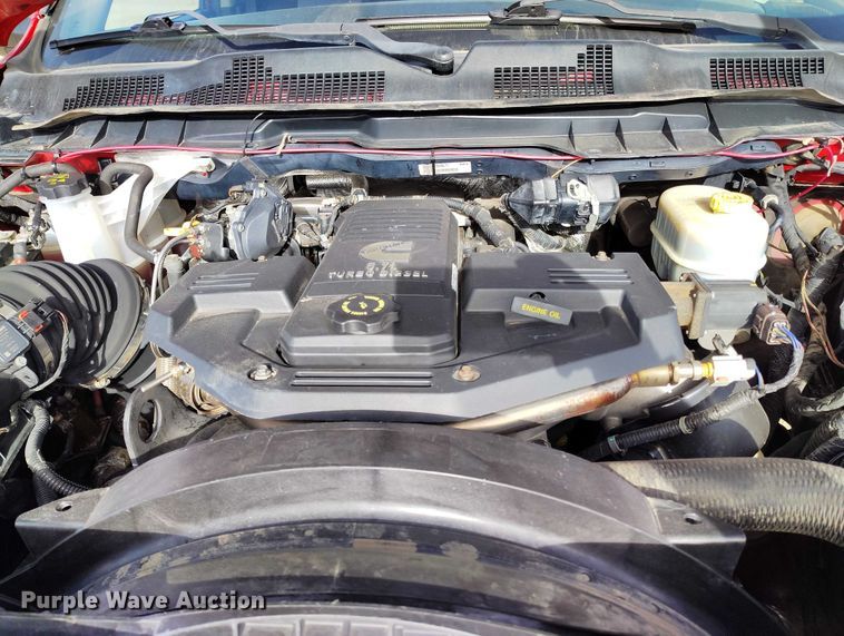 image for item DT0775 2016 RAM 3500 Crew Cab flatbed pickup truck