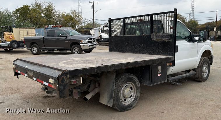 image for item DX5892 2012 Ford F350 Super Duty flatbed pickup truck
