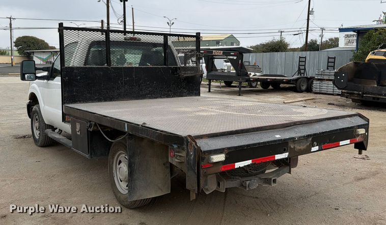 image for item DX5892 2012 Ford F350 Super Duty flatbed pickup truck