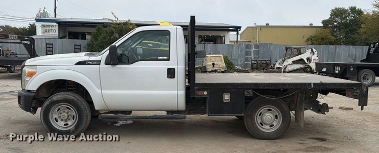 image for item DX5892 2012 Ford F350 Super Duty flatbed pickup truck