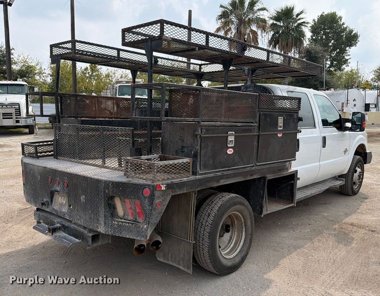 image for item DX5897 2015 Ford F350 Super Duty Crew Cab flatbed pickup truck