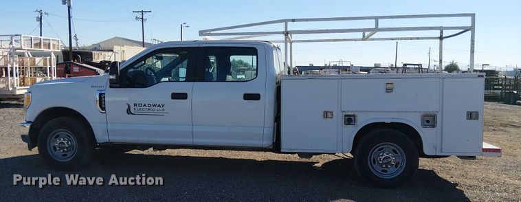 image for item EC1303 2017 Ford F250 Super Duty Crew Cab utility bed pickup truck