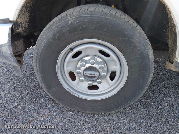 image for item EC1303 2017 Ford F250 Super Duty Crew Cab utility bed pickup truck