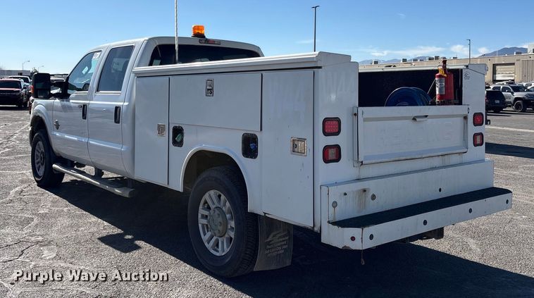 image for item EC8122 2015 Ford F250 Super Duty XLT Crew Cab utility bed pickup truck