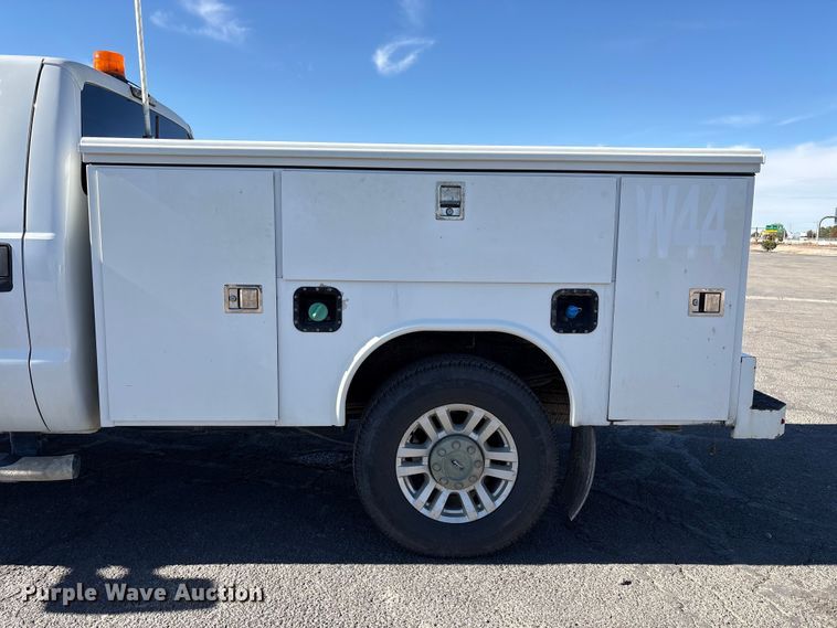 image for item EC8122 2015 Ford F250 Super Duty XLT Crew Cab utility bed pickup truck