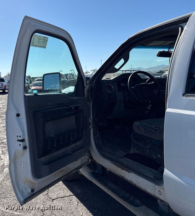 image for item EC8122 2015 Ford F250 Super Duty XLT Crew Cab utility bed pickup truck